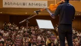一宮で講演 義手で奏でるパラ選手が語った「あきらめない心」