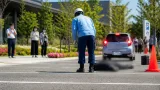 図書館駐車場でバックの車に巻き込まれ女性死亡 諫早市