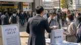 松戸駅前での街頭活動と永住許可厳格化巡る実務家の見解