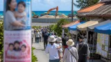 沖縄知事選、基地争点薄まり住民の「実利」論に焦点移る