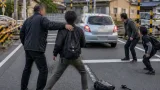 踏切での衝突、撮影者を車で脅した疑いで男送検